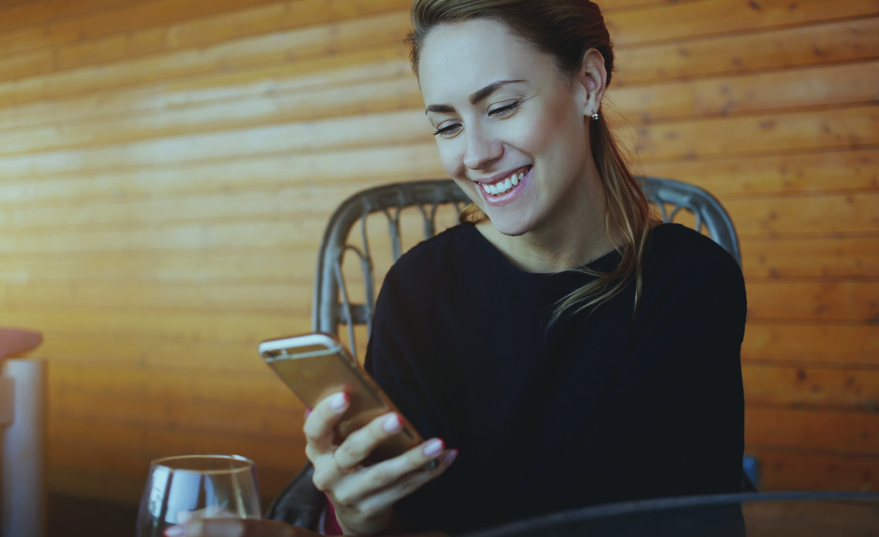 Lady on phone in kitchen